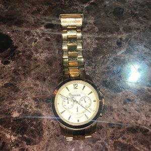 Gold fossil watch